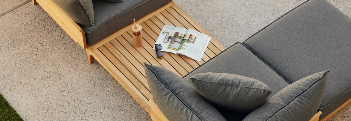 Teak table built into a comfy seating system
