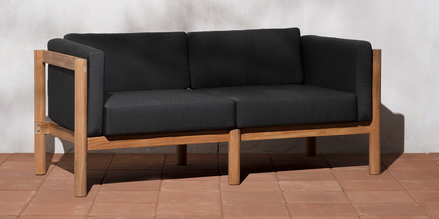 Neighbor outdoor loveseat with black cushions