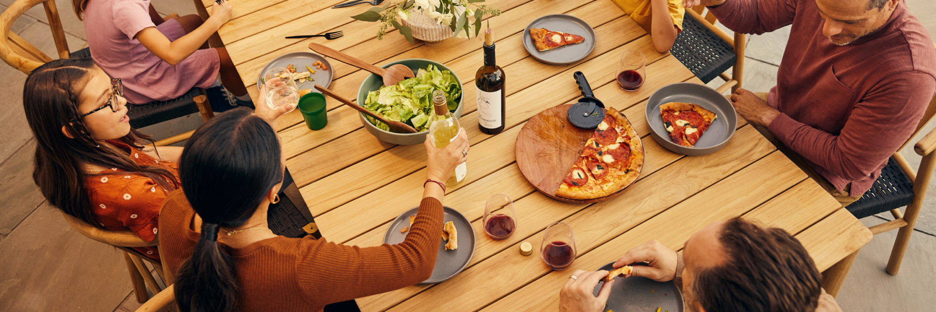 Neighbor teak outdoor dining table with food