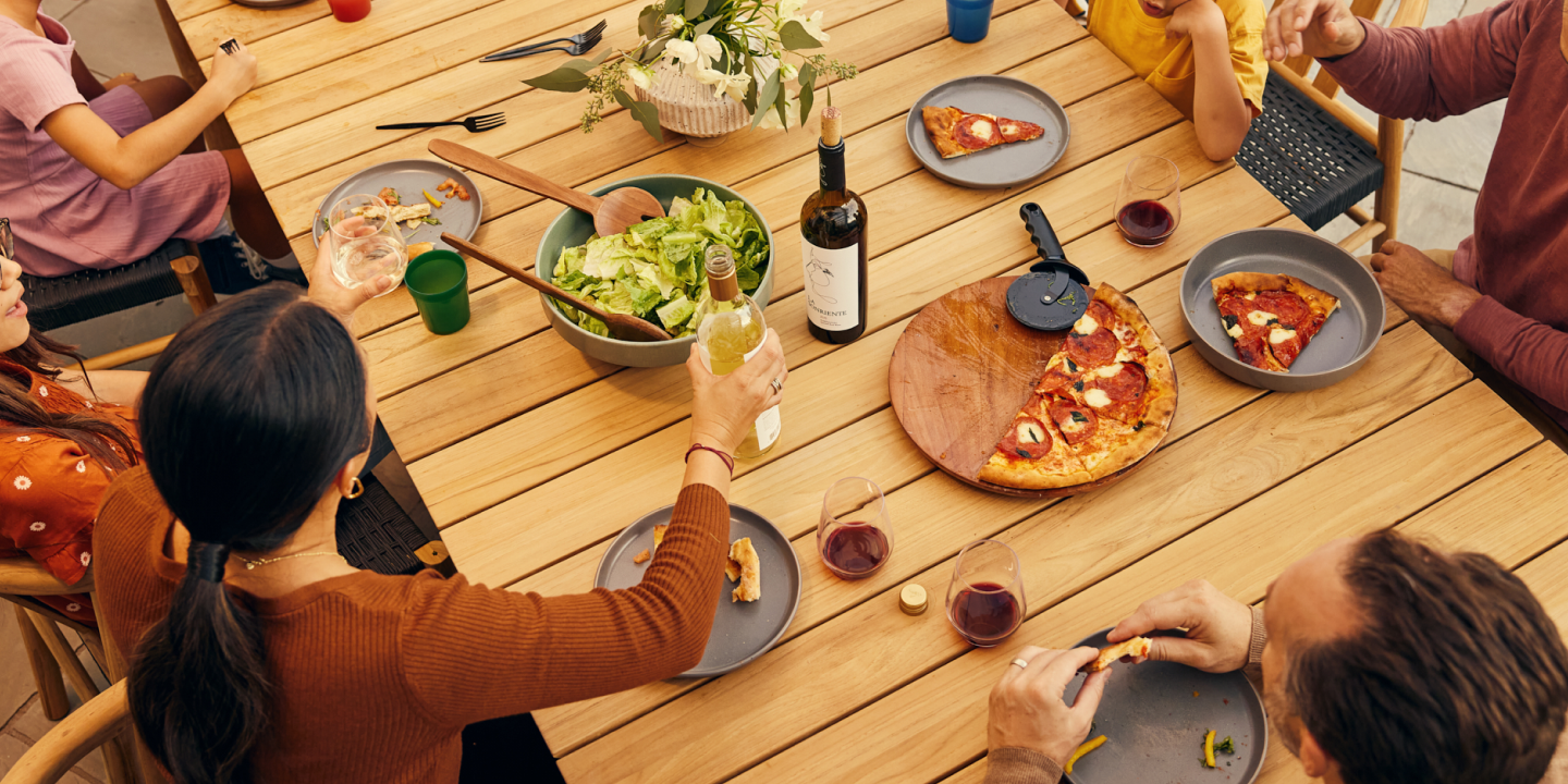 Neighbor teak outdoor dining table with food