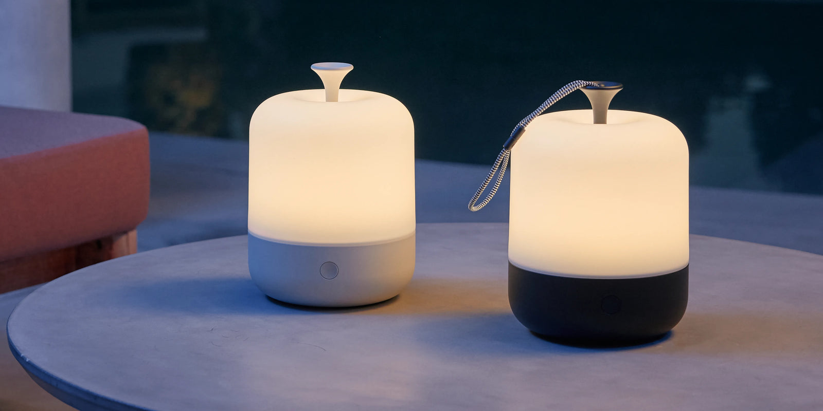 Closeup of Neighbor Acorn Lanterns in putty and charcoal in outdoor evening setting