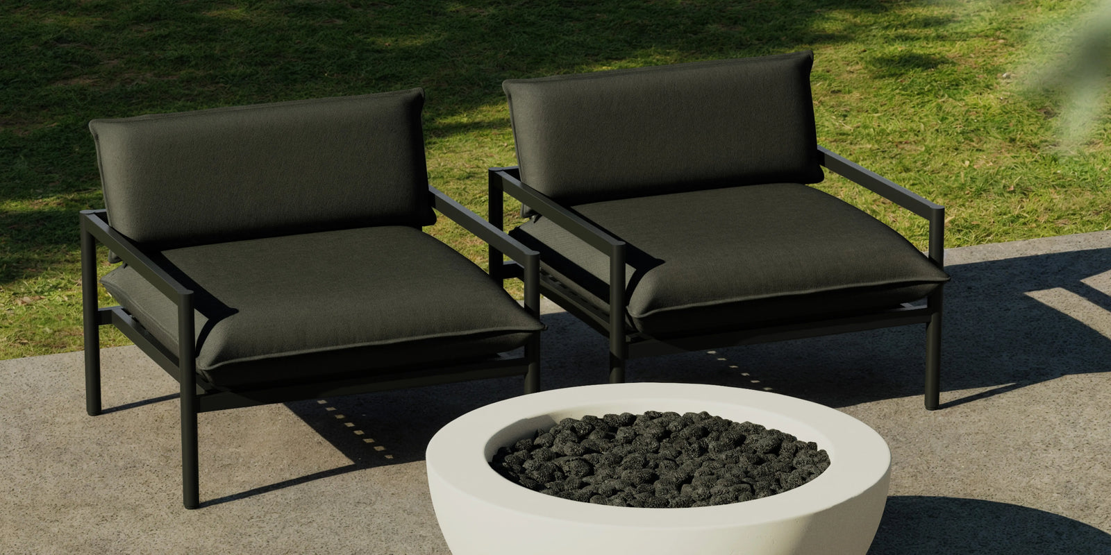 Closeup of Neighbor Coupe Adirondack Chair back slats in black POLYWOOD on outdoor patio