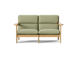Felloe Loveseat, with arms, in Heritage Leaf, front view