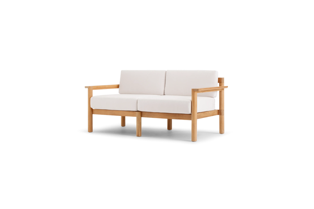 Haven Loveseat, with teak arms, in Canvas, three-quarter view