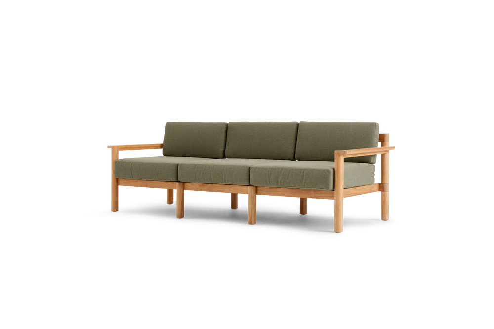 Haven Sofa, with teak arms, in Leaf, three-quarter view