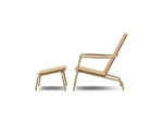 Side view of Neighbor Hopper Chair with Hopper Ottoman in sand color with aluminum frame and wood seat slats