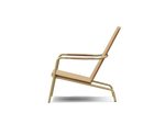 Neighbor Hopper Chair in sand finish, side profile view showing curved back and seat design with metal frame on black background