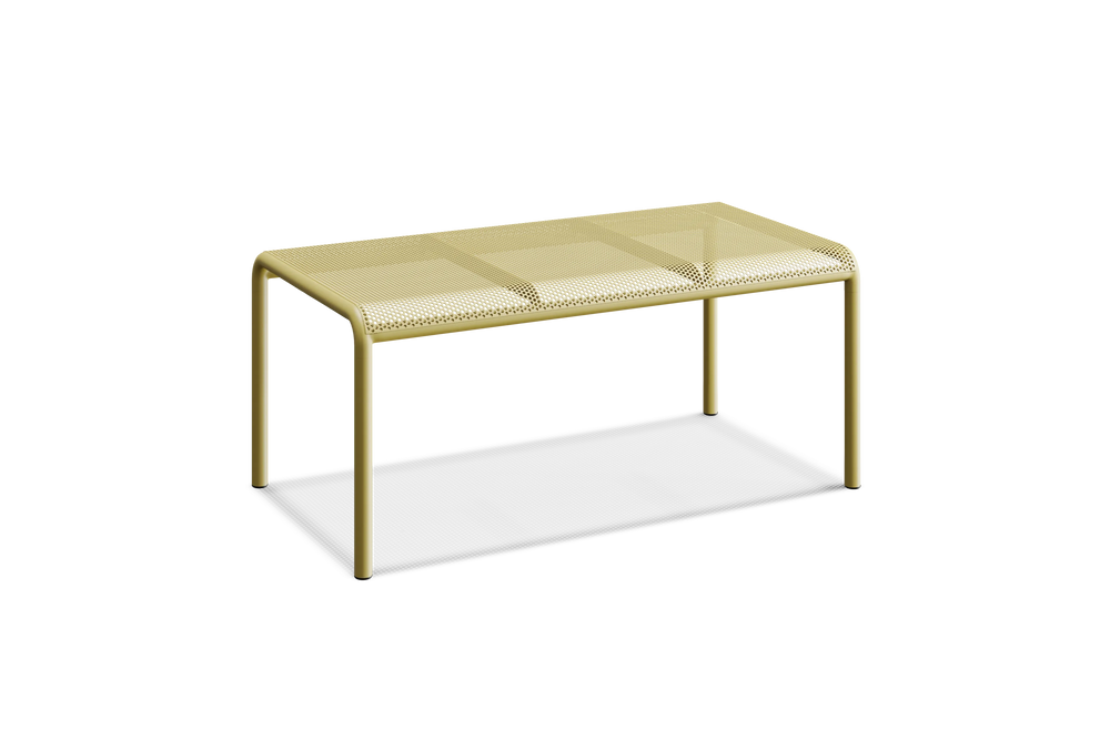 Perf Dining Table, in Butter, three-quarter view