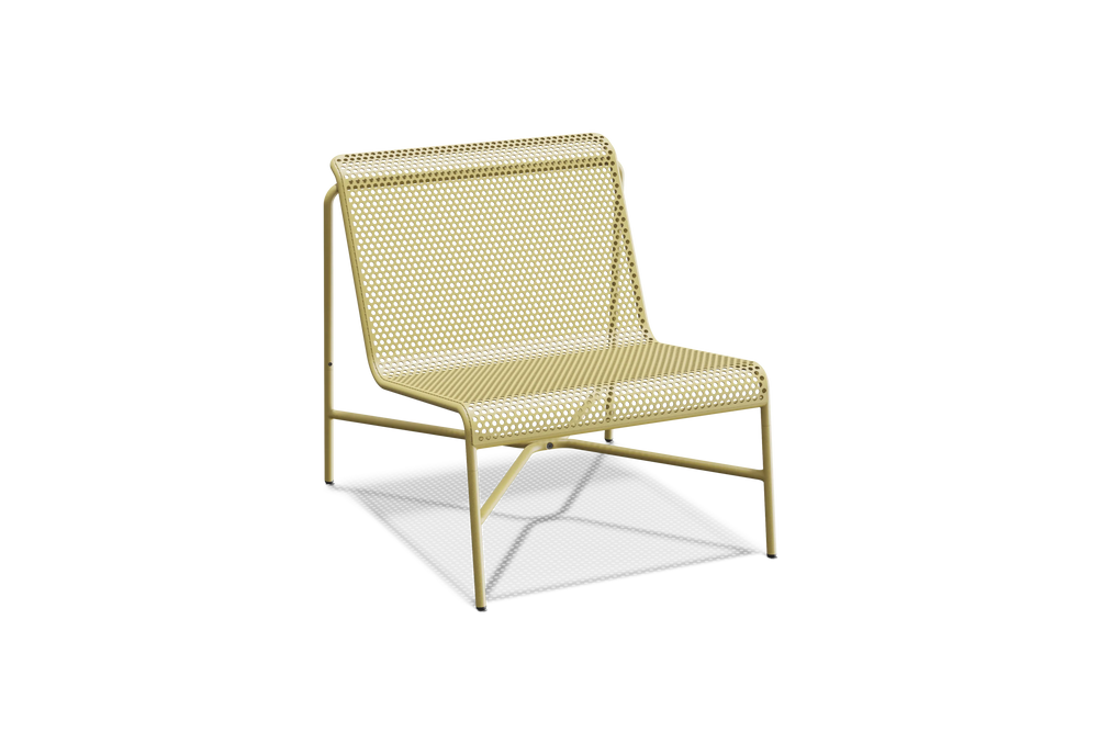 Perf Lounge Chair, in Butter, three-quarter view