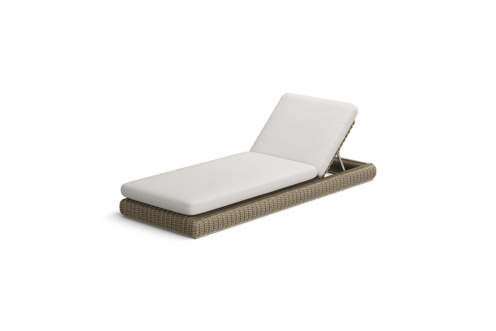 Neighbor Roundabout Sun Lounger with woven all-weather wicker base and a thick cushion, shown in articulated position with the backrest raised, cushion shown in natural wicker tan, three-quarter angle view.