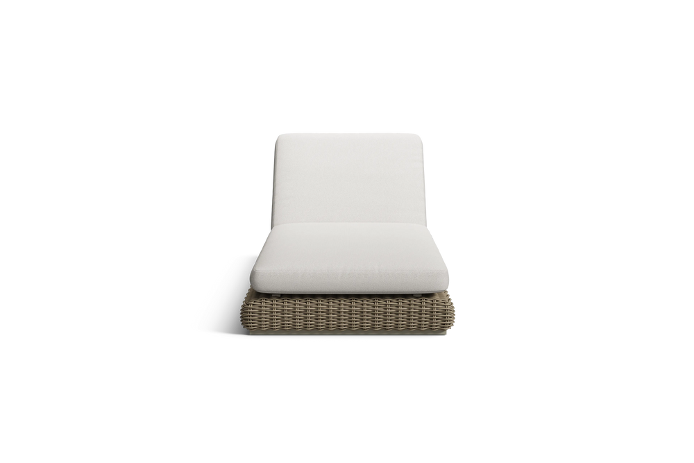 Neighbor Roundabout Sun Lounger with woven all-weather wicker base and a thick cushion, shown in articulated position with the backrest raised, cushion shown in natural wicker tan, front view.