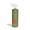 Green spray bottle with white nozzle on a white background