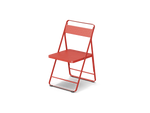 Neighbor Take Two Bistro Chair, an all-metal folding chair with perforated steel seat and backrest in coral red, three-quarter angle view.