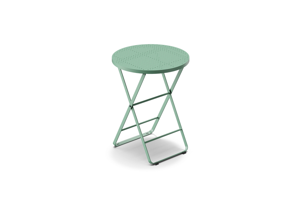 Neighbor Take Two Bistro Table, a small round folding outdoor side table with a perforated steel top in juniper green-blue, three-quarter angle view.