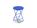 Neighbor Take Two Bistro Table, a small round folding outdoor side table with a perforated steel top in ultramarine blue, three-quarter angle view.