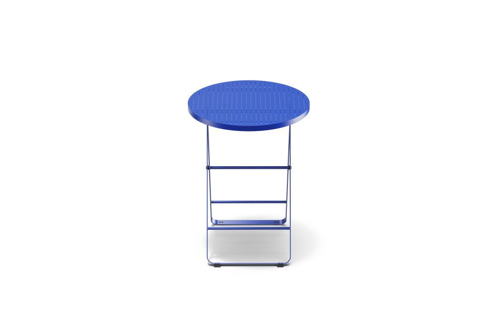 Neighbor Take Two Bistro Table, a small round folding outdoor side table with a perforated steel top in ultramarine blue, front view.