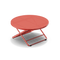 Neighbor Take Two Coffee Table, a round folding outdoor coffee table with a perforated steel top in coral red, three-quarter angle view.