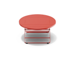 Neighbor Take Two Coffee Table, a round folding outdoor coffee table with a perforated steel top in coral red, front view.