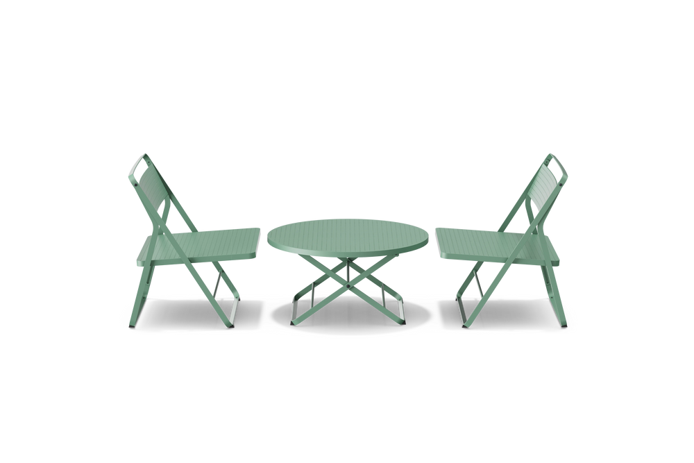 Neighbor Take Two Lounge Set with two perforated-steel folding lounge chairs and a matching round folding coffee table in juniper green-blue, side profile view.