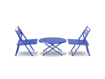 Neighbor Take Two Lounge Set with two perforated-steel folding lounge chairs and a matching round folding coffee table in ultramarine blue, side profile view.