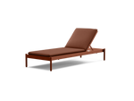 Terra Sun Lounger, in Rust, three-quarter view