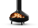 Neighbor Totem Chiminea, a sculptural enameled-steel outdoor fireplace with a rounded firebox and tall chimney on tripod legs in black enamel finish, three-quarter angle with logs burning inside the firebox.