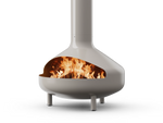 Neighbor Totem Chiminea, a sculptural enameled-steel outdoor fireplace with a rounded firebox and tall chimney on tripod legs in mushroom greige enamel finish, three-quarter angle with logs burning inside the firebox.