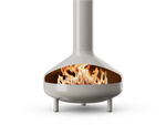 Neighbor Totem Chiminea, a sculptural enameled-steel outdoor fireplace with a rounded firebox and tall chimney on tripod legs in mushroom greige enamel finish, front view with logs burning inside the firebox.