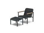 Neighbor Up-Down Chair shown together with the matching Up-Down Ottoman in charcoal black, three-quarter angle view.