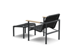 Neighbor Up-Down Chair shown together with the matching Up-Down Ottoman in charcoal black, rear view.