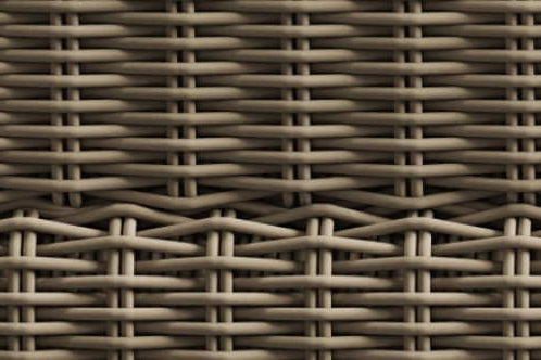 A closeup of woven synthetic wicker texture