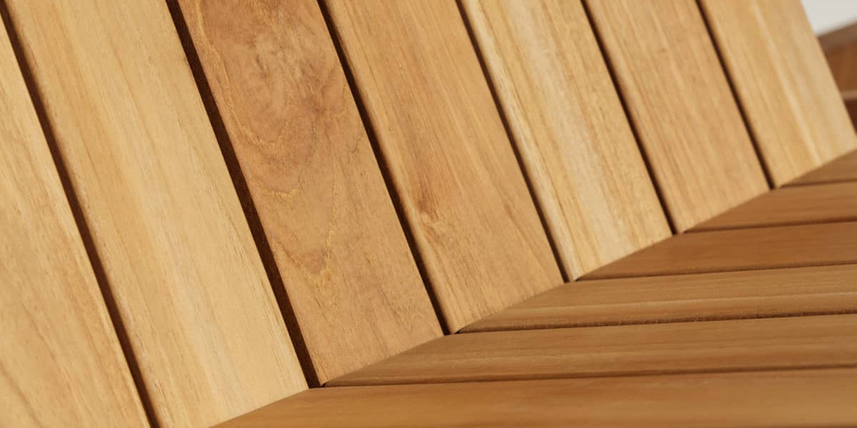 Close-up of teak planks from a portion of outdoor furniture
